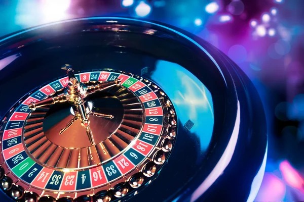 Live Colok Macau dealer at kedai69 table with card display